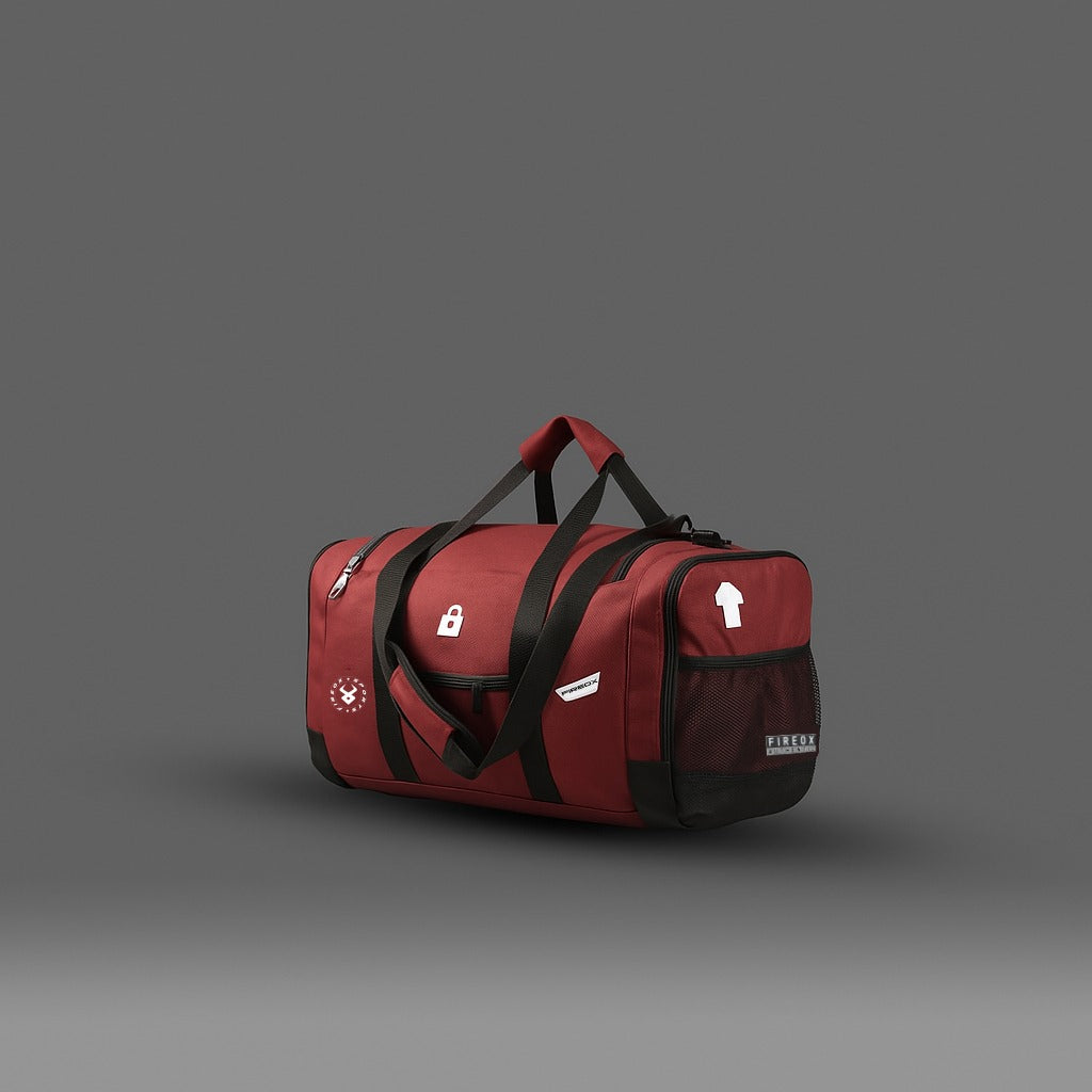 Red duffel bag with black straps on a gray background